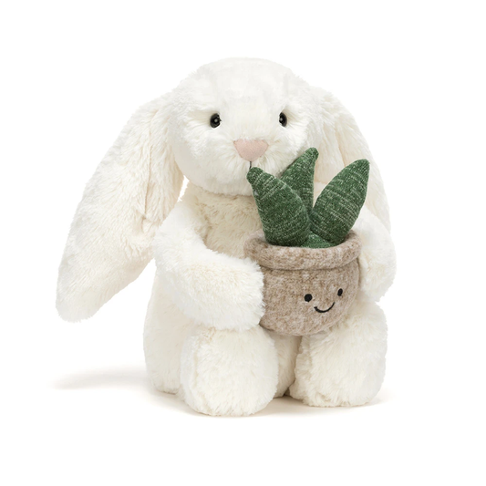 Peluche lapin crème tenant une plante – vue 2